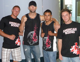 Coach Dave Nielsen with his athletes after weighins before Muay Thai Kickboxing competition