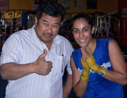 Gina Reyes Muay Thai fighter with Master Toddy